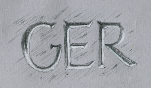 Schriften auf grauem Papier